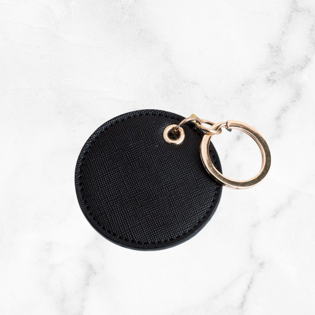 lynne black round keychain